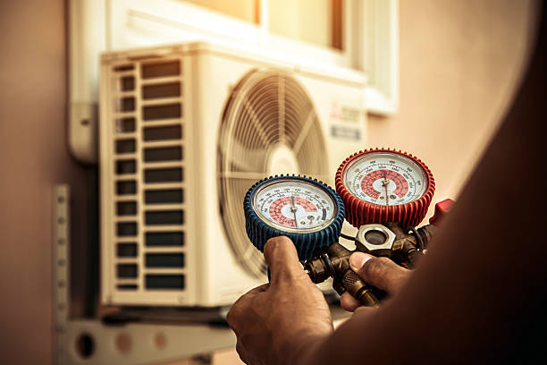 Professional Air Conditioning Service technician working in East Earl, PA